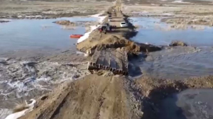 Мост смыло талыми водами в Восточном Казахстане