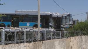 «Кладбище» автобусов в Алматы оказалось временным складом