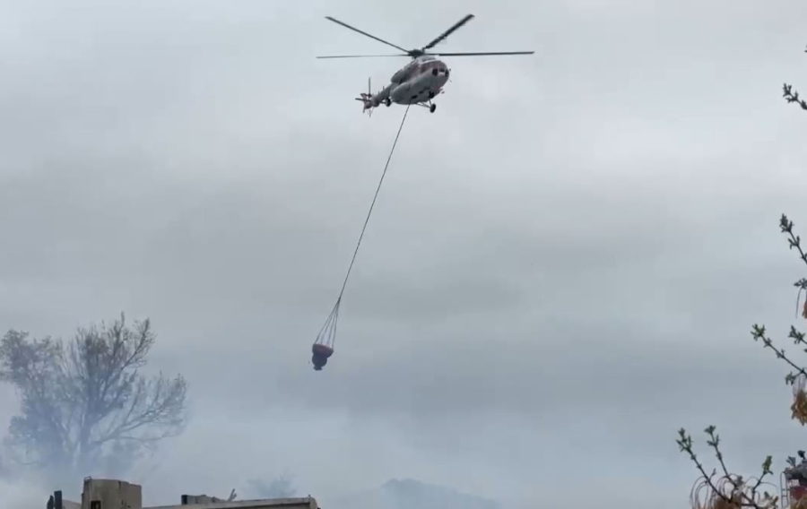 Вертолет подключили к тушению пожара в области Абай