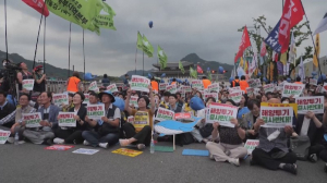 Сброс воды с «Фукусима-1»: визит главы МАГАТЭ вызвал протесты в Сеуле